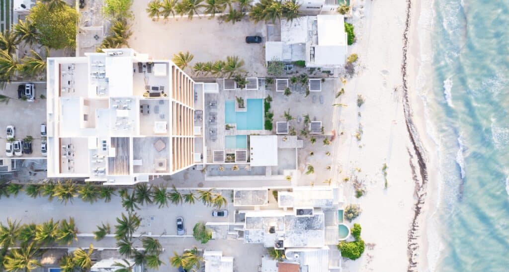beautiful drone shot of chicxulub beach merida mexico above litoral apartments mitch andrew visuals corporate videographers videography portfolio real estate videography