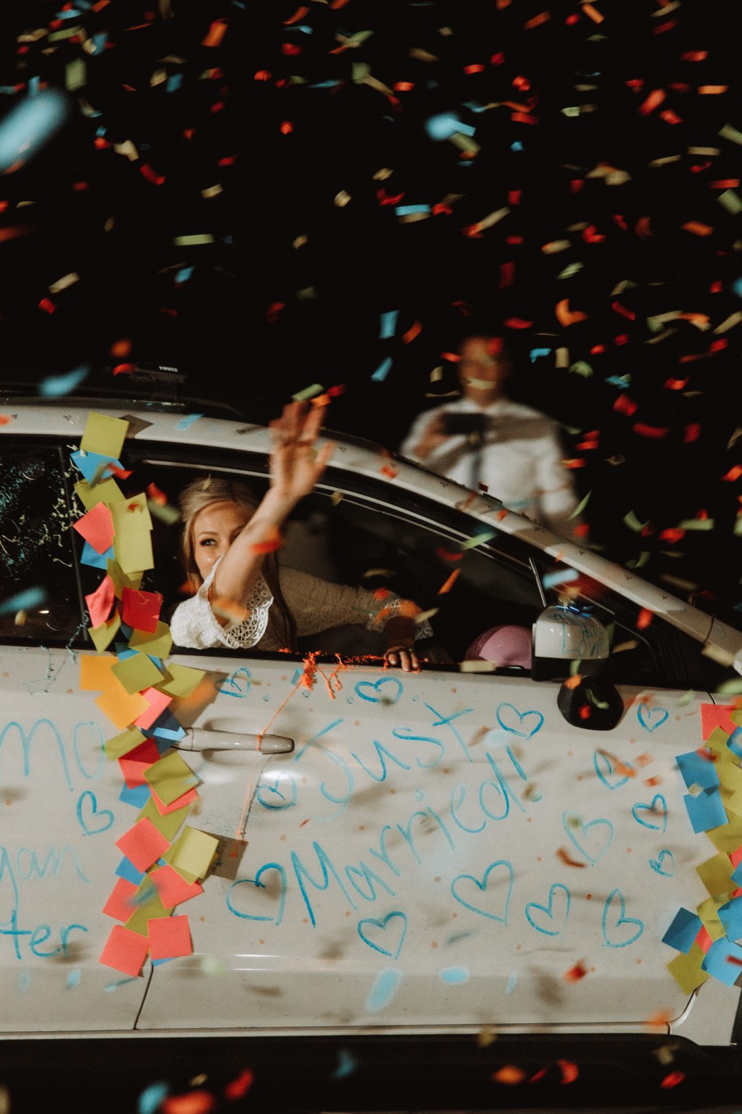 wedding couple send off in car with confetti corporate videographers wedding videographers Videography Portfolio